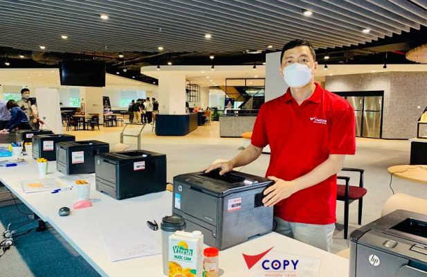 nen mua may photo cu hay moi 100 de kinh doanh0